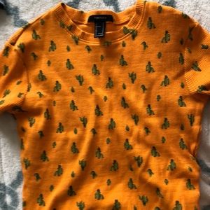 Orange crop top with catcus